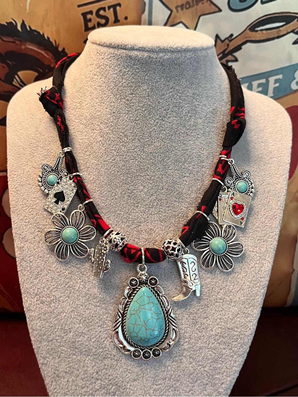 Western Boho Turquoise Charm Necklace on a Premium Black and Red Bandana